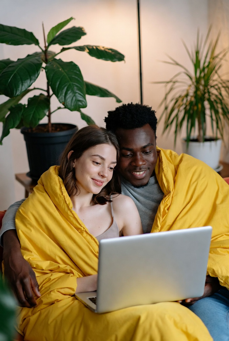 Happy couple relaxing at home